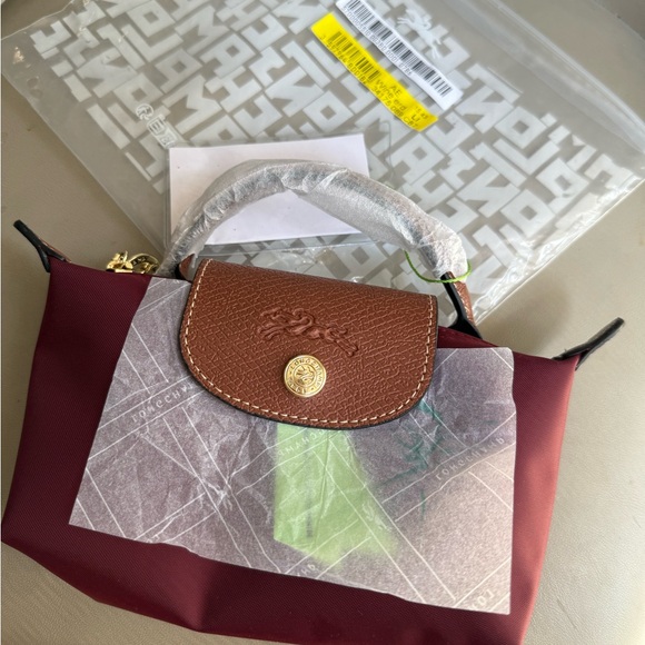 Longchamp Handbags - Longchamp Mini Le Pliage Top-Handle Bag in Burgundy with Brown Flap
